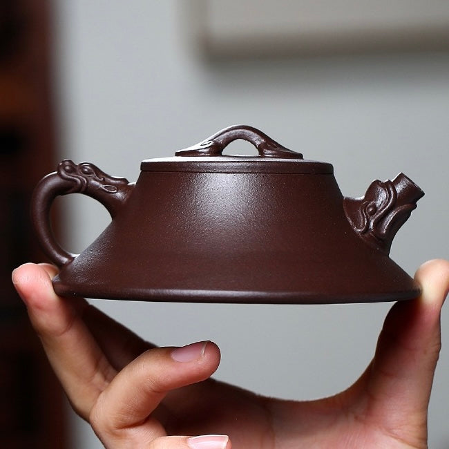 Bottom handheld view of semi-handmade Yixing raw Zhuni zisha teapot, standardized uniform structure for office and travel daily tea rituals SONGKILN